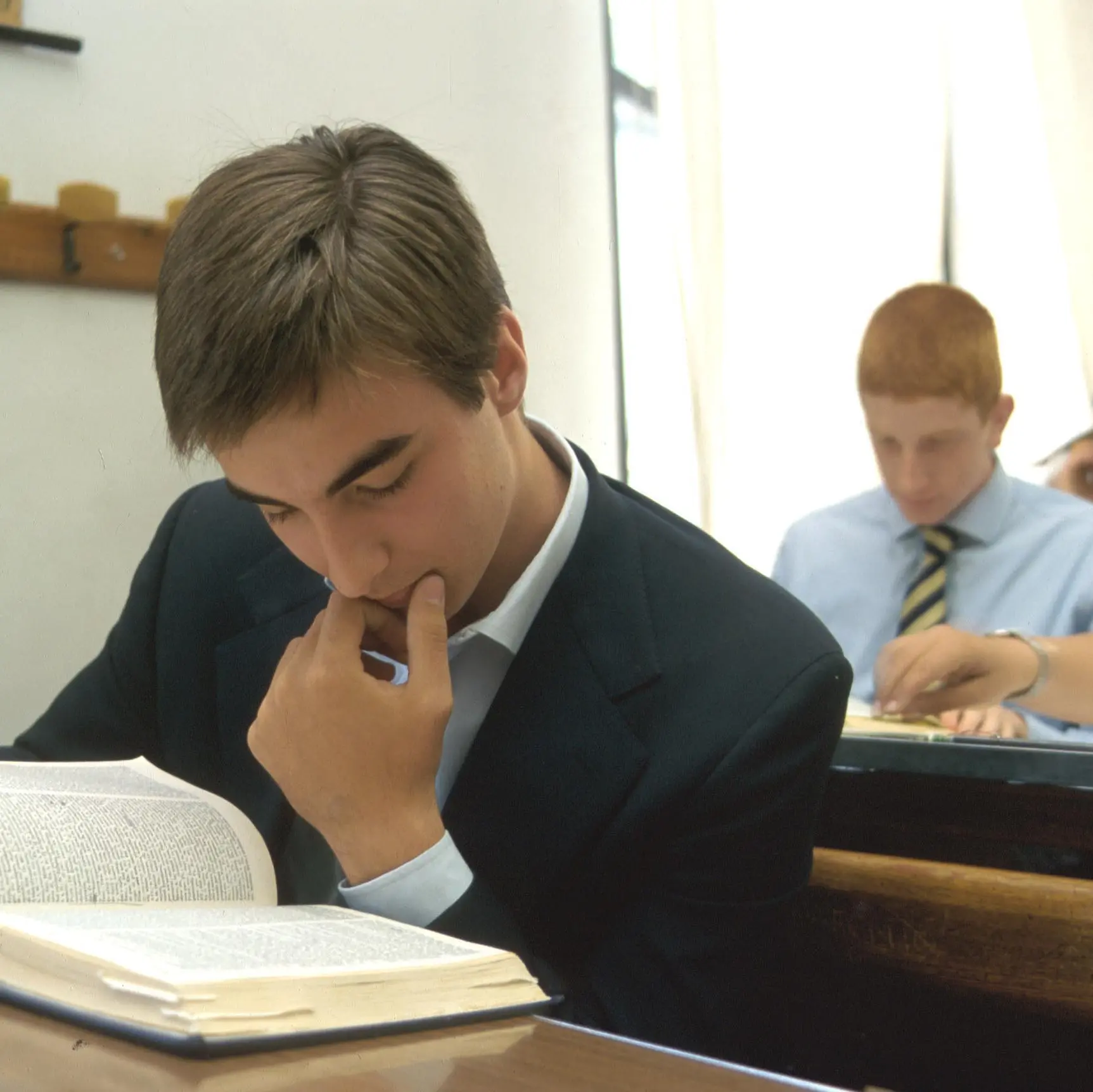 Arrivano i bonus per le paritarie, ma per la scuola pubblica solo tagli