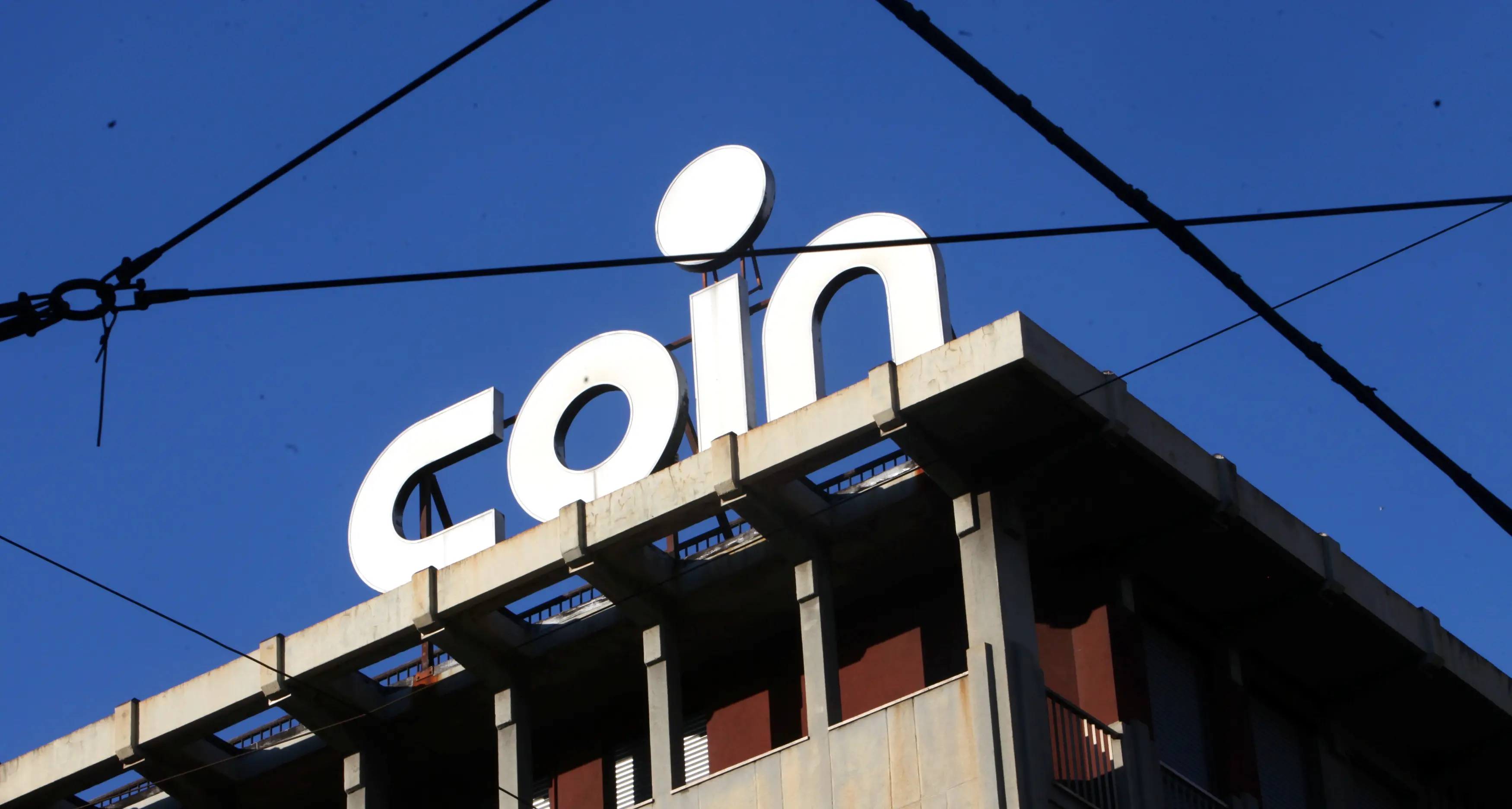 Coin, firmato accordo per gestire la crisi